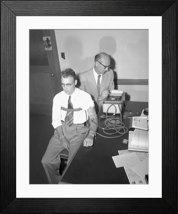 Framed Print : Suspect Getting His Lie Detection Test Framed Print : Suspect Getting His Lie Detection Test