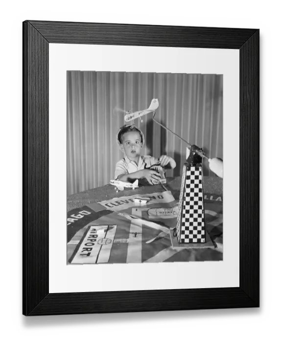 Framed Print : Child Playing With Flying Helicopter Framed Print : Child Playing With Flying Helicopter