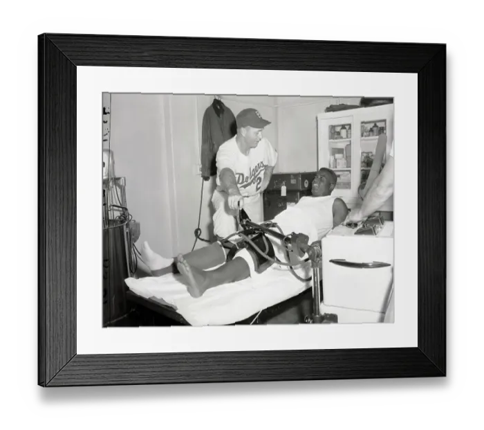Framed Print : Jackie Robinson Lying Down for Knee Treatment Framed Print : Jackie Robinson Lying Down for Knee Treatment