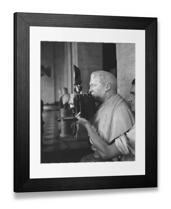 Framed Print : Sculpture Holding a Camera Framed Print : Sculpture Holding a Camera