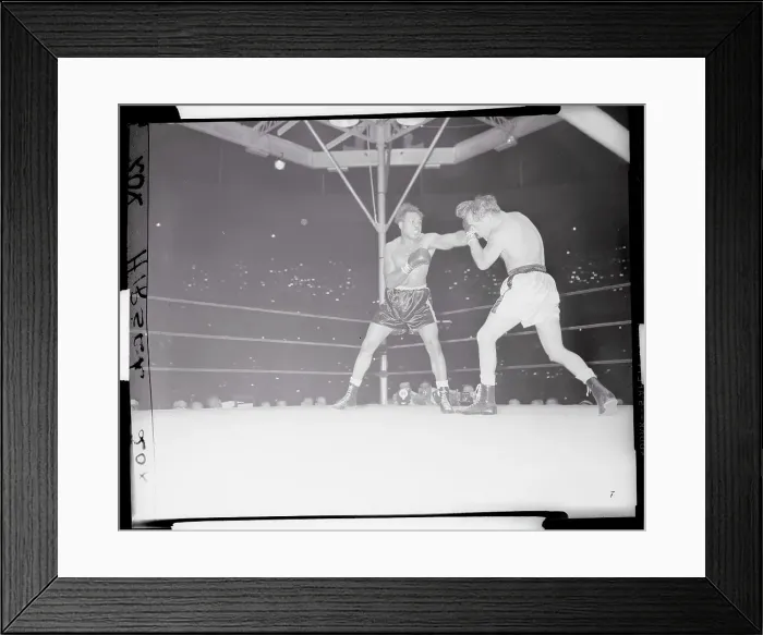 Framed Print : Carl Olson Boxing Against Archie Moore Framed Print : Carl Olson Boxing Against Archie Moore