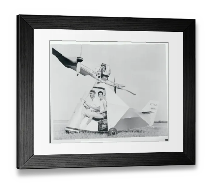 Framed Print : Couple Inside Flying Machine Framed Print : Couple Inside Flying Machine