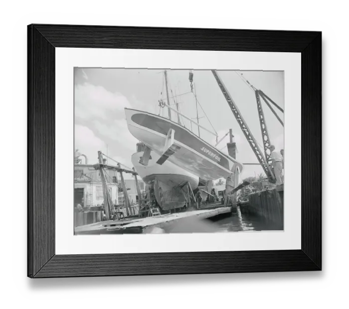 Framed Print : Lowering the Superfoil into the Water