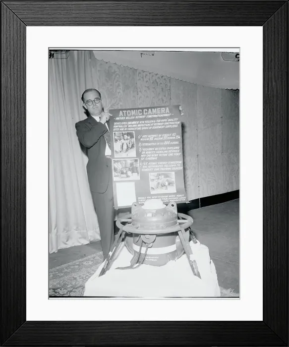 Framed Print : A.L. Dowling Posing Next to Atomic Camera Framed Print : A.L. Dowling Posing Next to Atomic Camera