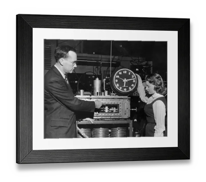 Framed Print : Charles H. Townes Showing Atomic Clock to Marianne MacDonald Framed Print : Charles H. Townes Showing Atomic Clock to Marianne MacDonald