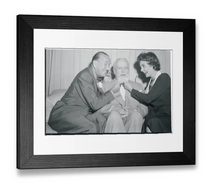 Framed Print : Noel Coward and Jean Simmons Tugging on Frank Sennes Beard