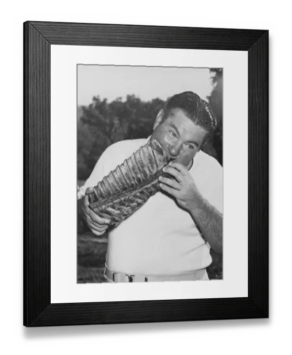 Framed Print : Golfer Ed Oliver Biting into Long Pork Rib Cage Framed Print : Golfer Ed Oliver Biting into Long Pork Rib Cage
