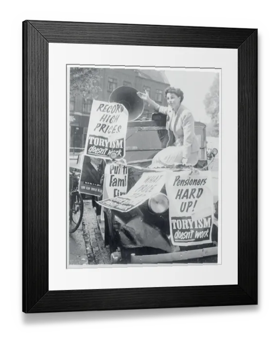 Framed Print : Woman Waving from Atop a Poster Covered Taxi Framed Print : Woman Waving from Atop a Poster Covered Taxi