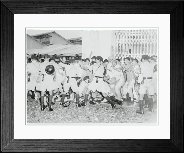 Framed Print : Policemen Trying to Control a Crowd Framed Print : Policemen Trying to Control a Crowd