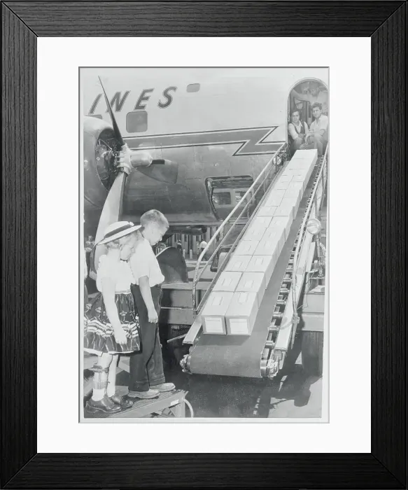 Framed Print : Children Watching Boxes on a Conveyor Belt Framed Print : Children Watching Boxes on a Conveyor Belt