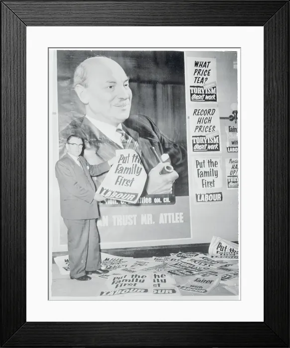 Framed Print : Morgan Phillips Holding a Campaign Poster Framed Print : Morgan Phillips Holding a Campaign Poster