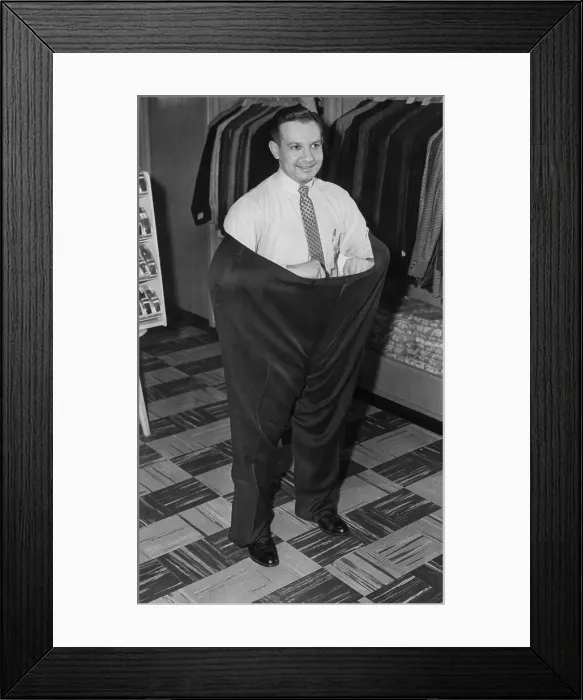 Framed Print : Man Wearing Extremely Large Slacks Framed Print : Man Wearing Extremely Large Slacks