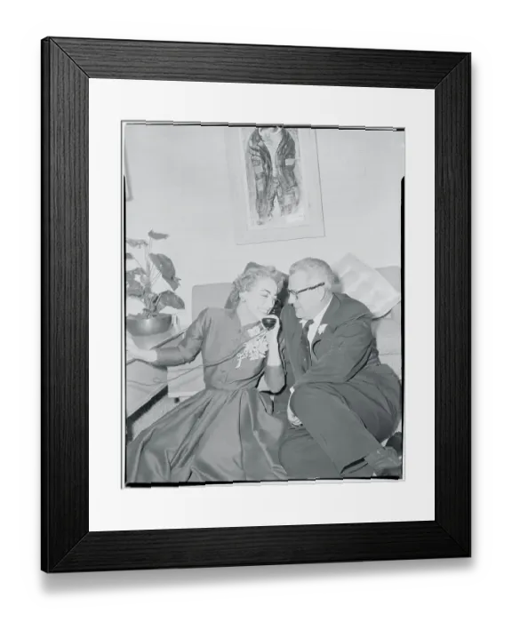Framed Print : Joan Crawford and Husband Listening on Telephone Framed Print : Joan Crawford and Husband Listening on Telephone