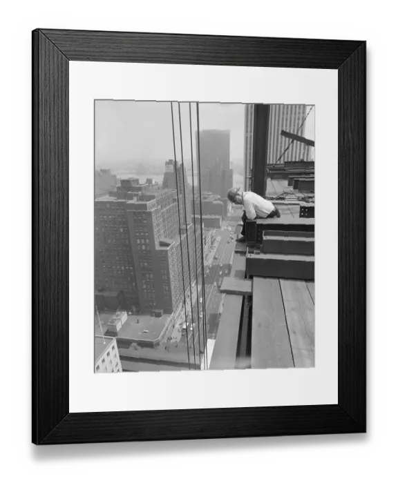 Framed Print : Construction Worker Looking over Building Edge Framed Print : Construction Worker Looking over Building Edge