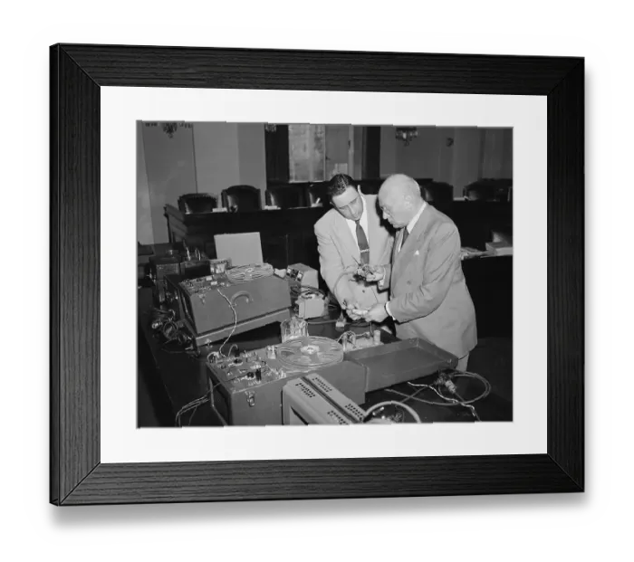 Framed Print : Men Inspecting Electronics Equipment for Bugging Trial Framed Print : Men Inspecting Electronics Equipment for Bugging Trial