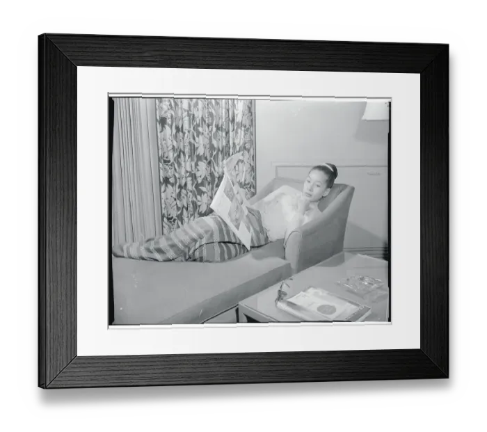 Framed Print : Burmese Woman Reclining on Sofa Framed Print : Burmese Woman Reclining on Sofa