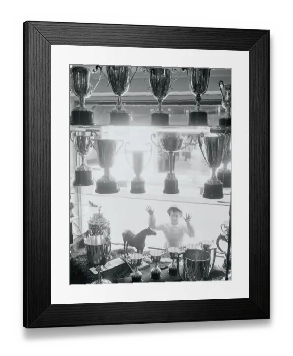Framed Print : Youngster Gazing into Window at Trophies Framed Print : Youngster Gazing into Window at Trophies