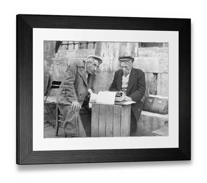 Framed Print : Street Scribe Using a Typewriter Framed Print : Street Scribe Using a Typewriter