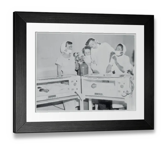 Framed Print : New Father Supported by Nurses Framed Print : New Father Supported by Nurses