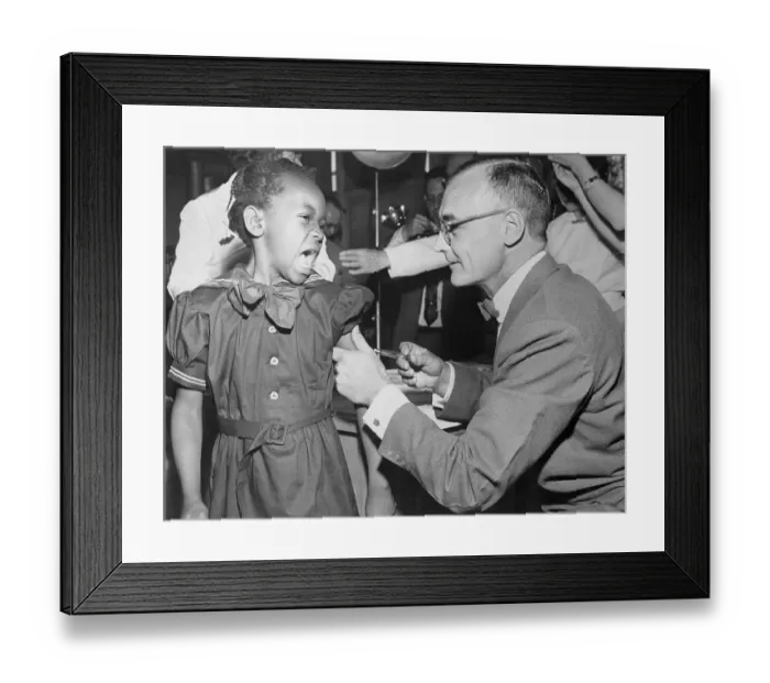 Framed Print : Girl Receiving Polio Vaccine