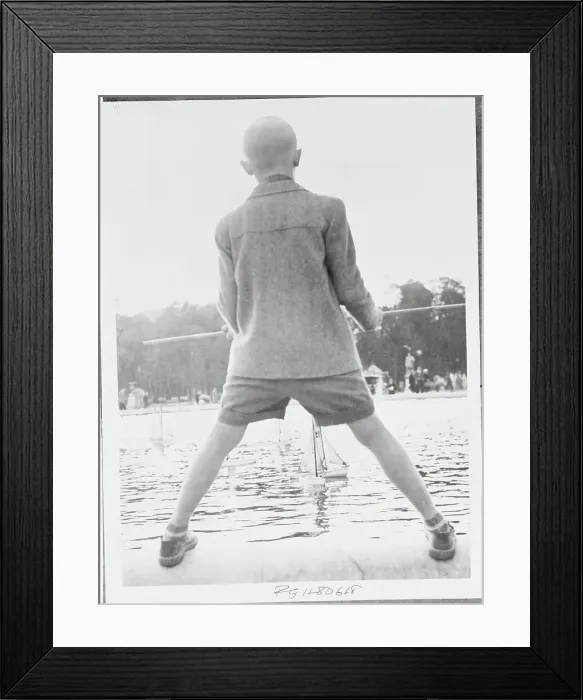 Framed Print : Boy Viewing Model Sail Boats Framed Print : Boy Viewing Model Sail Boats