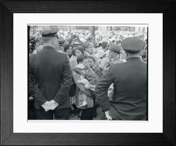 Framed Print : Child Asleep in Crowd Framed Print : Child Asleep in Crowd