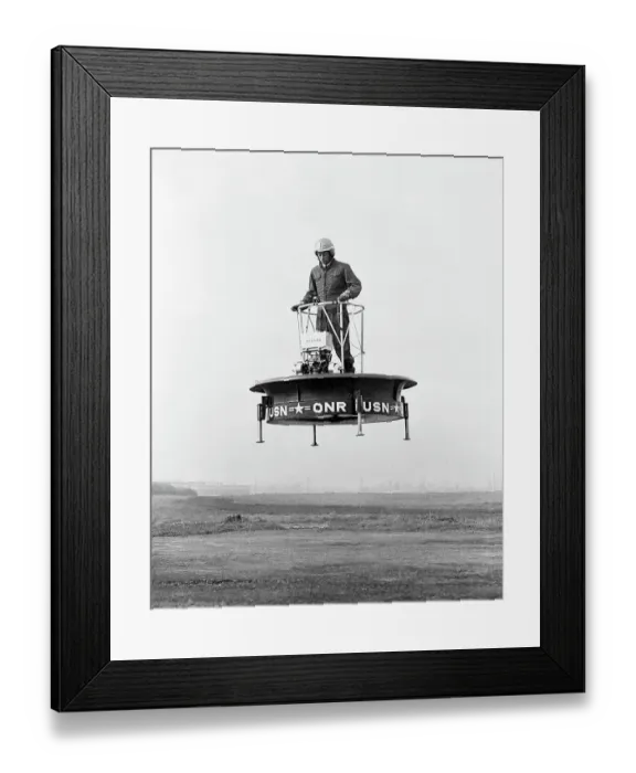 Framed Print : Test Pilot Demonstrating Use of Flying Platform
