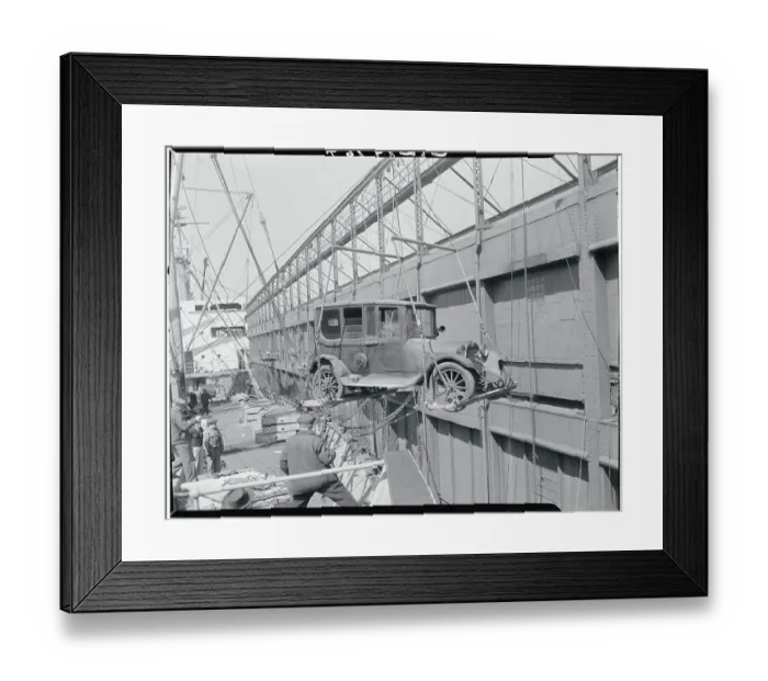 Framed Print : Automobile Being Lowered from Ship Framed Print : Automobile Being Lowered from Ship