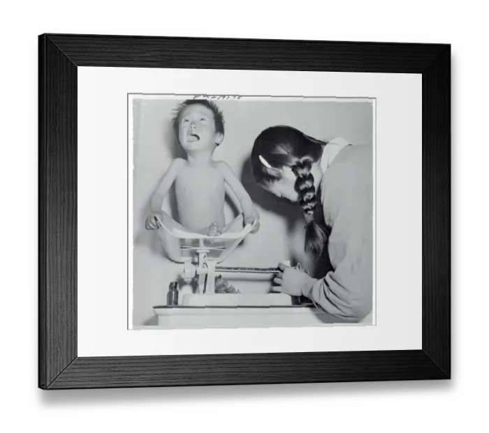 Framed Print : Child Being Weighed on Scale Framed Print : Child Being Weighed on Scale