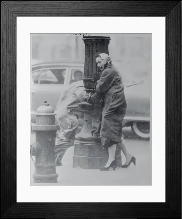 Framed Print : Woman Holding onto Lamp Post Framed Print : Woman Holding onto Lamp Post