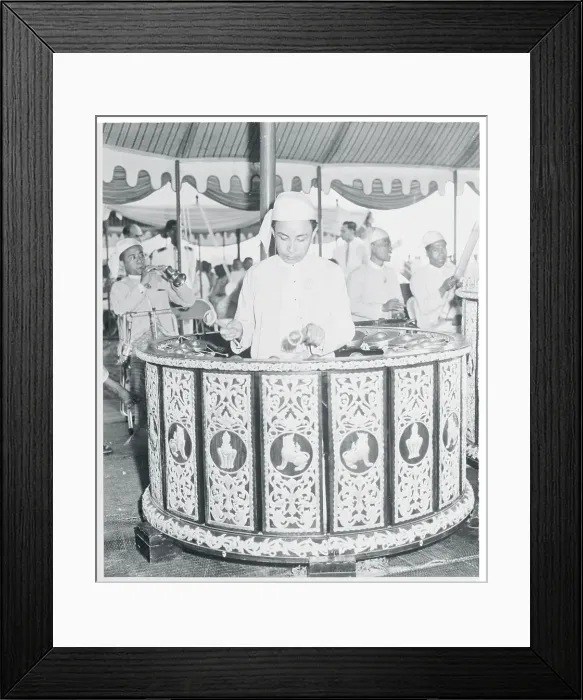 Framed Print : Man Inside Large Musical Creation Framed Print : Man Inside Large Musical Creation