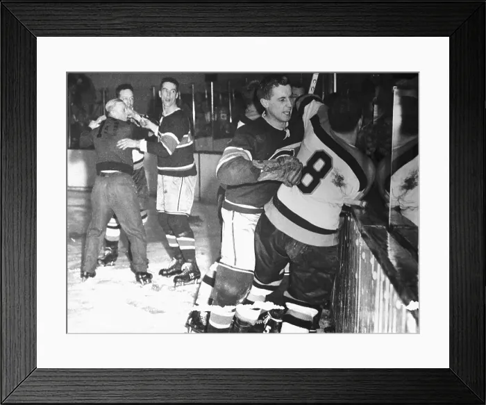 Framed Print : Players Restraining Each Other During Fight