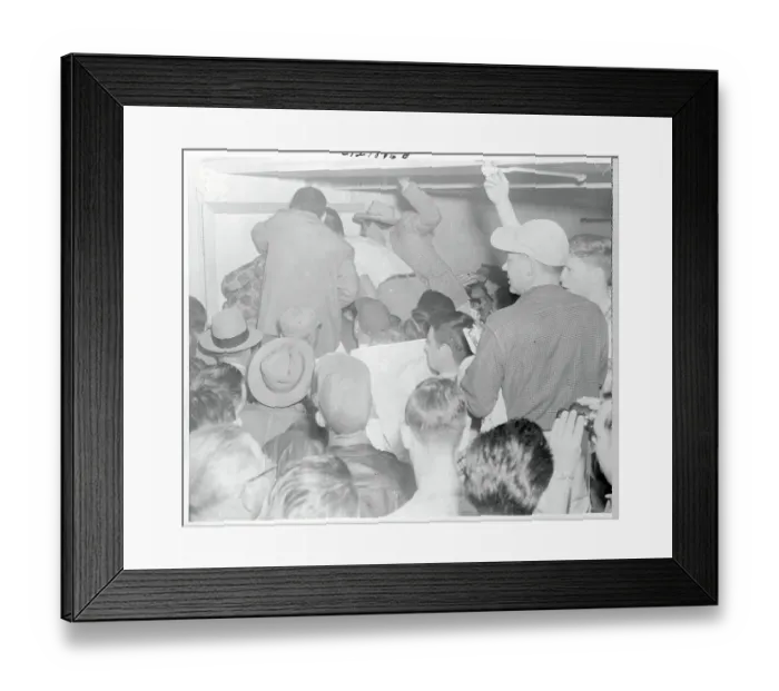 Framed Print : People Crowding Around a Map Framed Print : People Crowding Around a Map