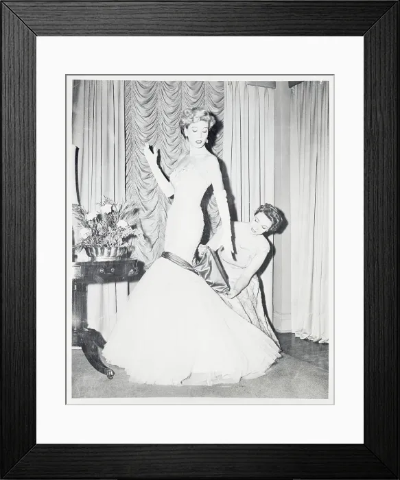 Framed Print : Woman Adjusting Sash on Ball Gown
