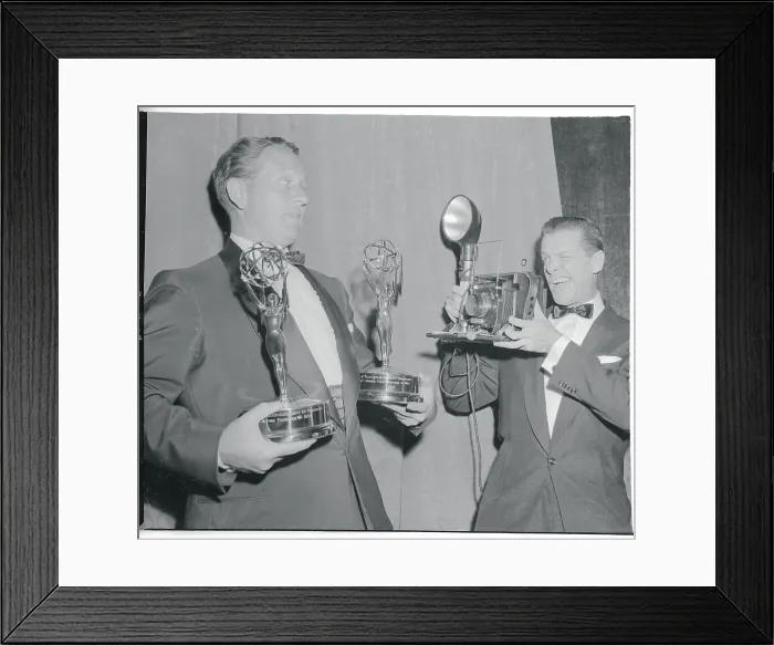Framed Print : Comedian Robert Cummings Photographing Art Linkletter Holding Awards Framed Print : Comedian Robert Cummings Photographing Art Linkletter Holding Awards
