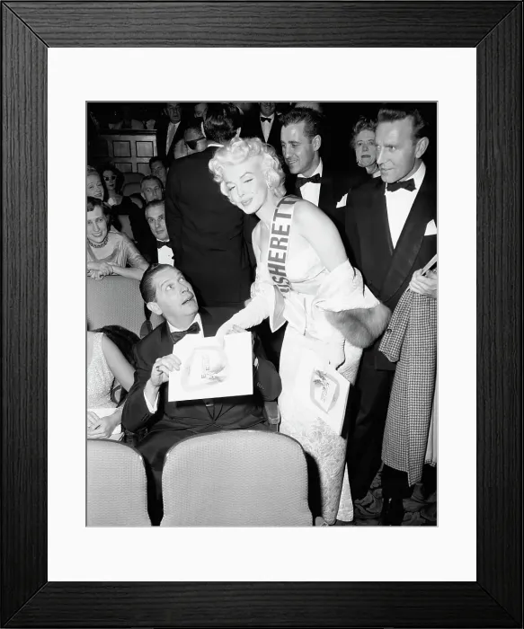 Framed Print : Marilyn Monroe Gives Milton Berle a Program Framed Print : Marilyn Monroe Gives Milton Berle a Program