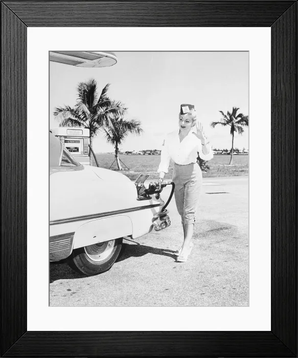 Framed Print : Woman Operating Gas Pump on Broad Causeway, Miami Framed Print : Woman Operating Gas Pump on Broad Causeway, Miami
