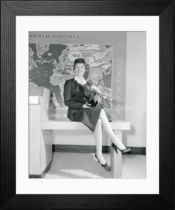 Framed Print : Flight Attendant Modeling New Uniform Framed Print : Flight Attendant Modeling New Uniform