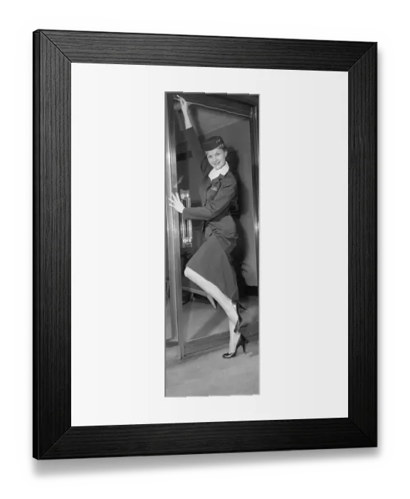Framed Print : Flight Attendant Modeling New Uniform Framed Print : Flight Attendant Modeling New Uniform