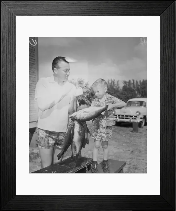 Framed Print : Baseball Player Duke Snider Showing His Son a Fish Framed Print : Baseball Player Duke Snider Showing His Son a Fish