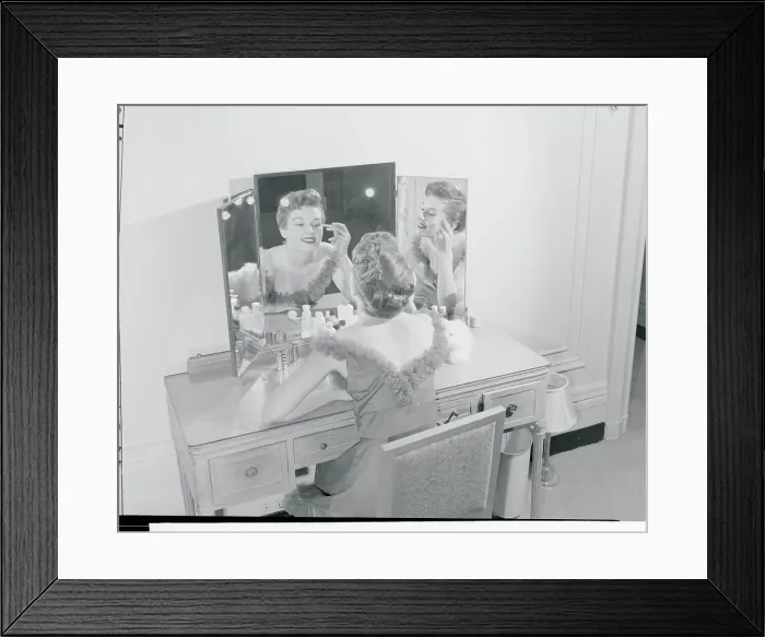 Framed Print : Model Making up Her Face at Vanity Table Framed Print : Model Making up Her Face at Vanity Table