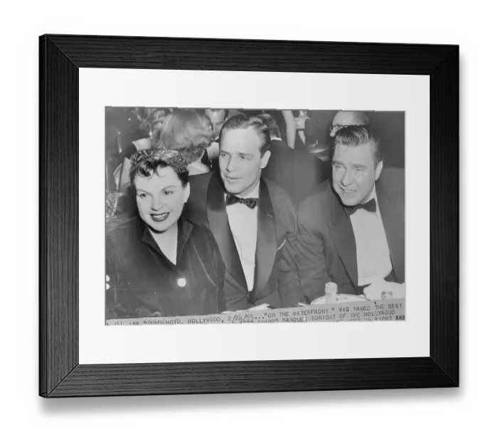 Framed Print : Judy Garland Sitting with Male Oscar Nominees Framed Print : Judy Garland Sitting with Male Oscar Nominees