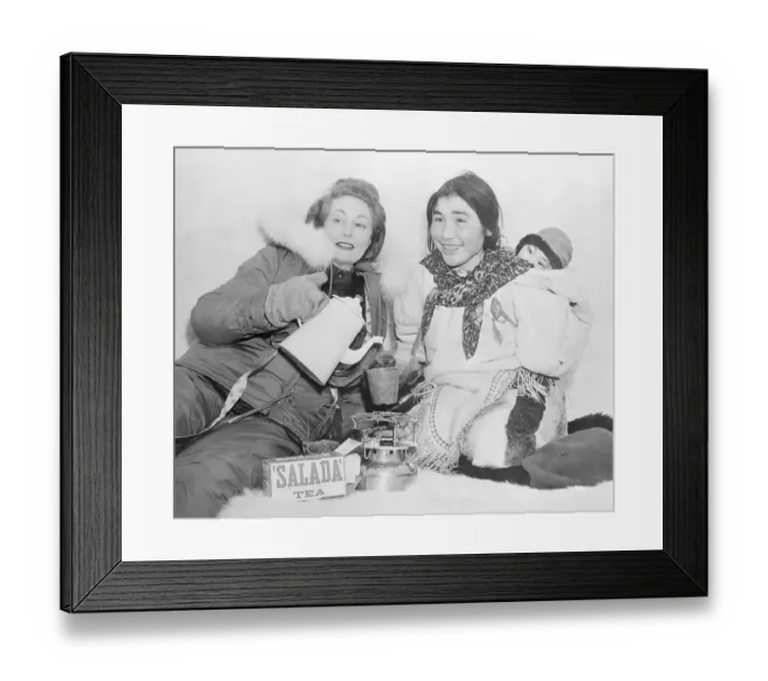 Framed Print : Women Resting in Igloo Framed Print : Women Resting in Igloo