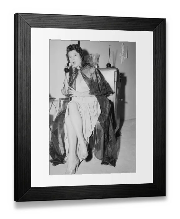 Framed Print : Ann Corio Holding a Phone
