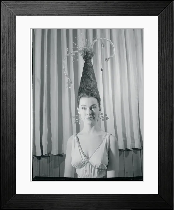 Framed Print : Model Wearing Unusual and Piled High Hairdo Framed Print : Model Wearing Unusual and Piled High Hairdo