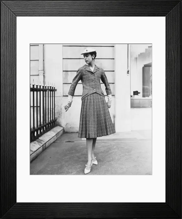 Framed Print : Woman Modeling a Christian Dior Jacketed Dress