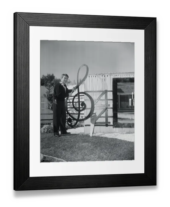 Framed Print : Liberace Standing Next to His Musical Fence Framed Print : Liberace Standing Next to His Musical Fence