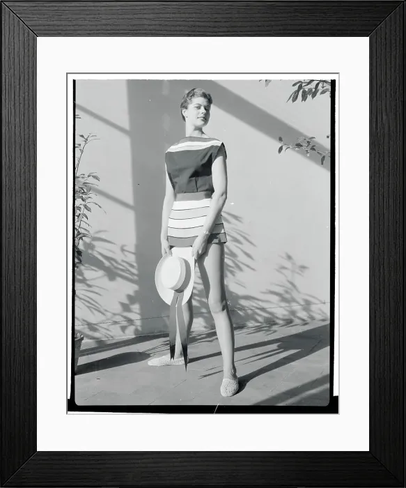 Framed Print : Female Model Wearing Beach Wear in Outside Scene Framed Print : Female Model Wearing Beach Wear in Outside Scene