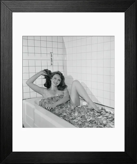 Framed Print : Marian Caroon Bathing in a Tub of Silver Dollars Framed Print : Marian Caroon Bathing in a Tub of Silver Dollars