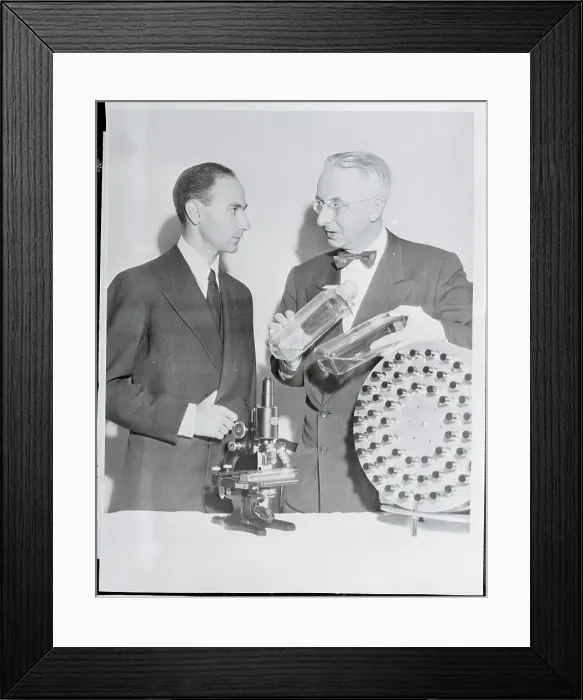 Framed Print : Humberto Fernandez-Moran Examining Bottles Framed Print : Humberto Fernandez-Moran Examining Bottles
